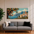 Panoramic coastal artwork showing a Mediterranean village overlooking the sea with white buildings and a domed church set against blue mountains. In the foreground a large lemon tree heavy with bright citrus fruit frames the scene while additional lemons and greenery fill the lower landscape, creating a vibrant Amalfi Coast inspired composition.