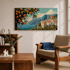 Panoramic coastal artwork showing a Mediterranean village overlooking the sea with white buildings and a domed church set against blue mountains. In the foreground a large lemon tree heavy with bright citrus fruit frames the scene while additional lemons and greenery fill the lower landscape, creating a vibrant Amalfi Coast inspired composition.