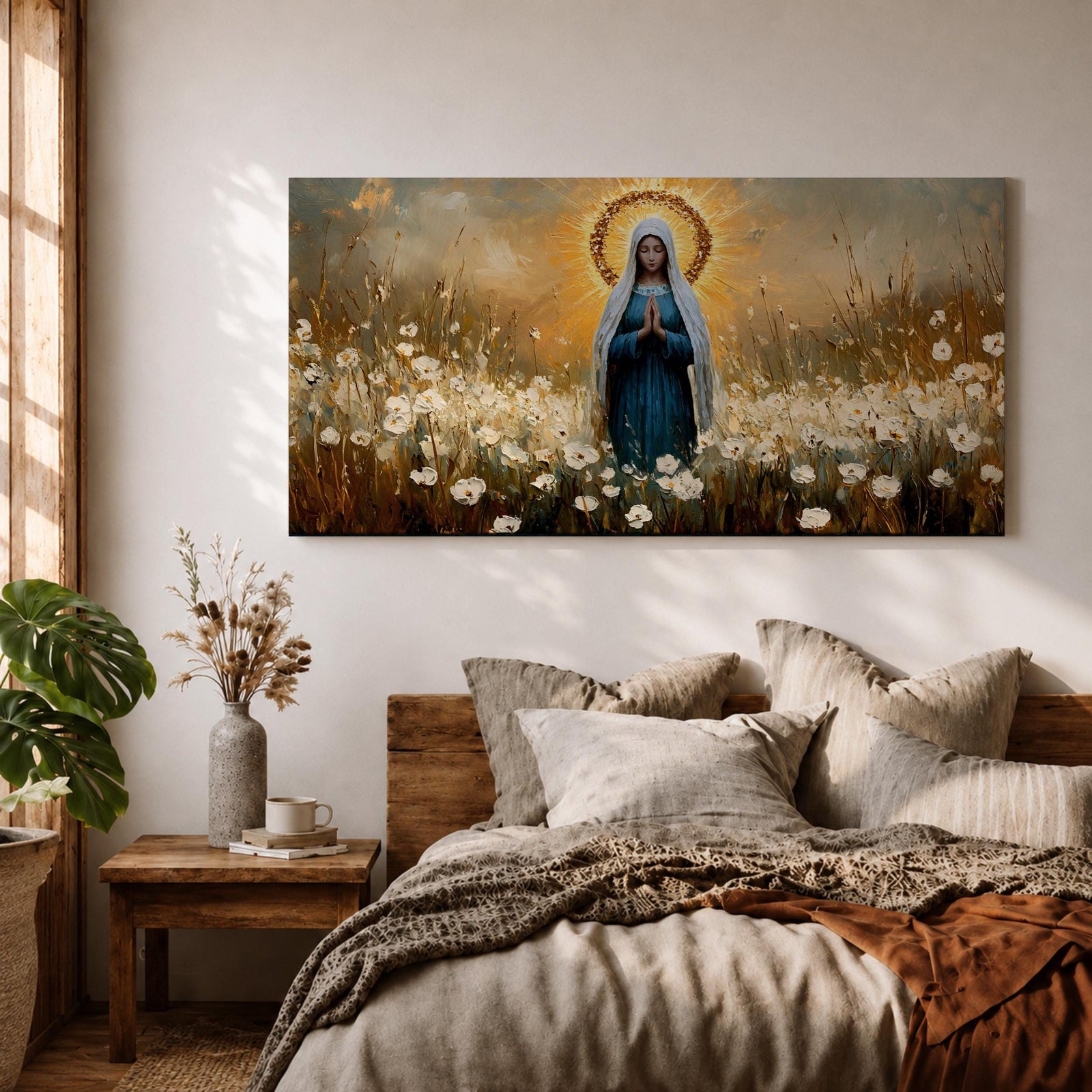 Panoramic painting depicting the Virgin Mary standing in a field of white flowers with hands gently clasped in prayer. A radiant golden halo surrounds her head while warm light fills the sky behind her, and soft brushstrokes capture flowing robes and delicate blossoms across the landscape.