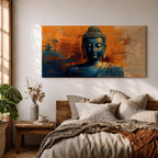 Panoramic artwork depicting a serene Buddha portrait with closed eyes and calm expression against a textured abstract background. Deep blue tones define the figure while bold orange and gold brushstrokes create contrast around the head and shoulders, emphasizing a tranquil meditative presence.