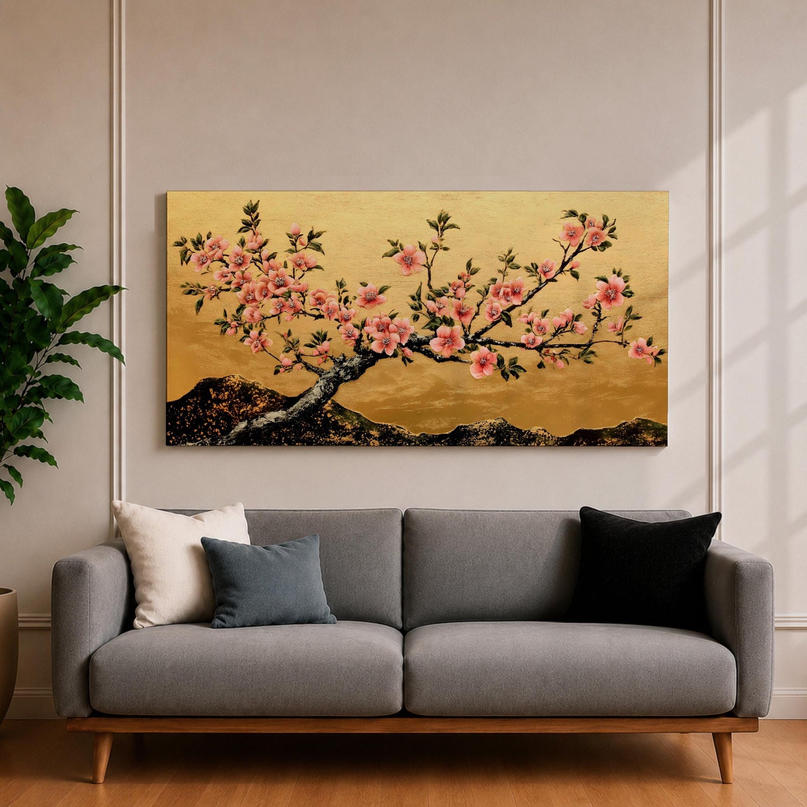 A panoramic painting of a flowering cherry blossom branch extending across the composition with clusters of soft pink sakura flowers and dark textured bark, set against a rich gold background with distant mountain silhouettes, rendered in a Japanese inspired style with detailed petals and balanced horizontal composition.
