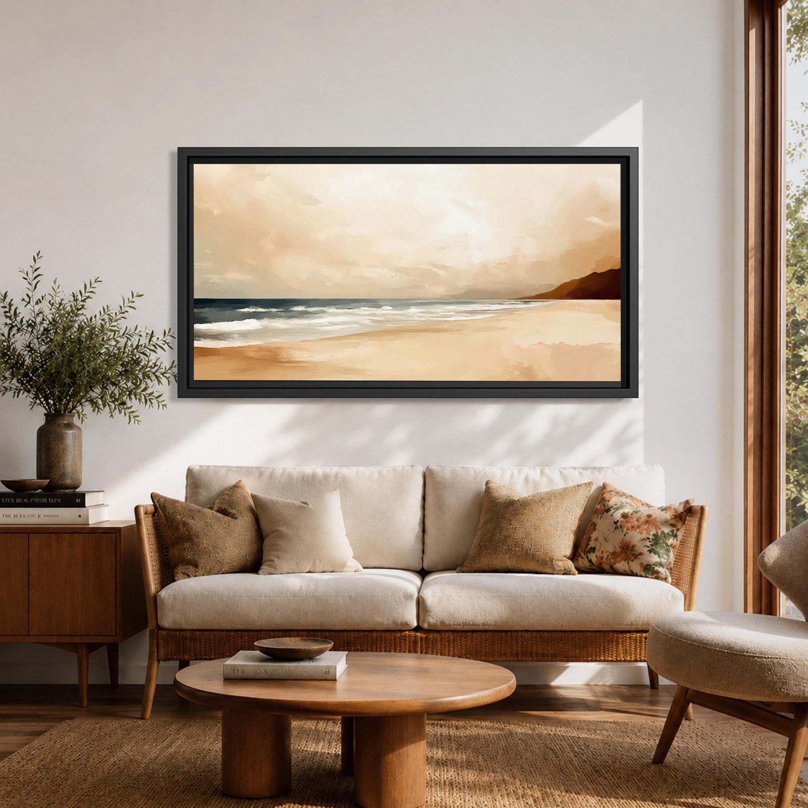 Panoramic coastal landscape painting showing a quiet sandy beach with gentle ocean waves rolling onto the shore beneath a soft sky. Subtle tones of beige, blue, and warm gray create a calm atmosphere while distant hills stretch along the horizon and light reflects across the water.