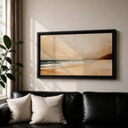 Panoramic coastal landscape painting showing a quiet sandy beach with gentle ocean waves rolling onto the shore beneath a soft sky. Subtle tones of beige, blue, and warm gray create a calm atmosphere while distant hills stretch along the horizon and light reflects across the water.