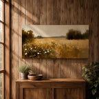 A panoramic painting of a golden meadow filled with tall grasses and scattered white wildflowers stretching across an open countryside field toward a distant horizon, bordered by darker tree clusters and rendered with soft impressionist brushstrokes in warm earthy tones that create depth and a quiet rural atmosphere.