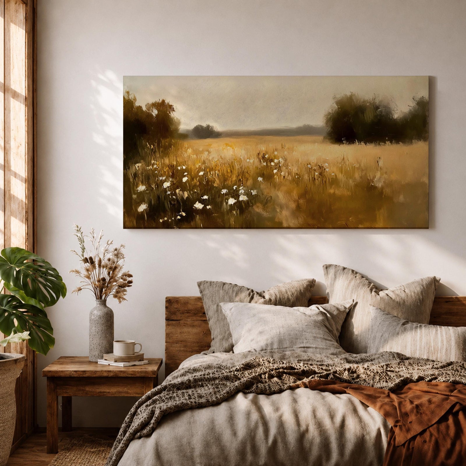 A panoramic painting of a golden meadow filled with tall grasses and scattered white wildflowers stretching across an open countryside field toward a distant horizon, bordered by darker tree clusters and rendered with soft impressionist brushstrokes in warm earthy tones that create depth and a quiet rural atmosphere.