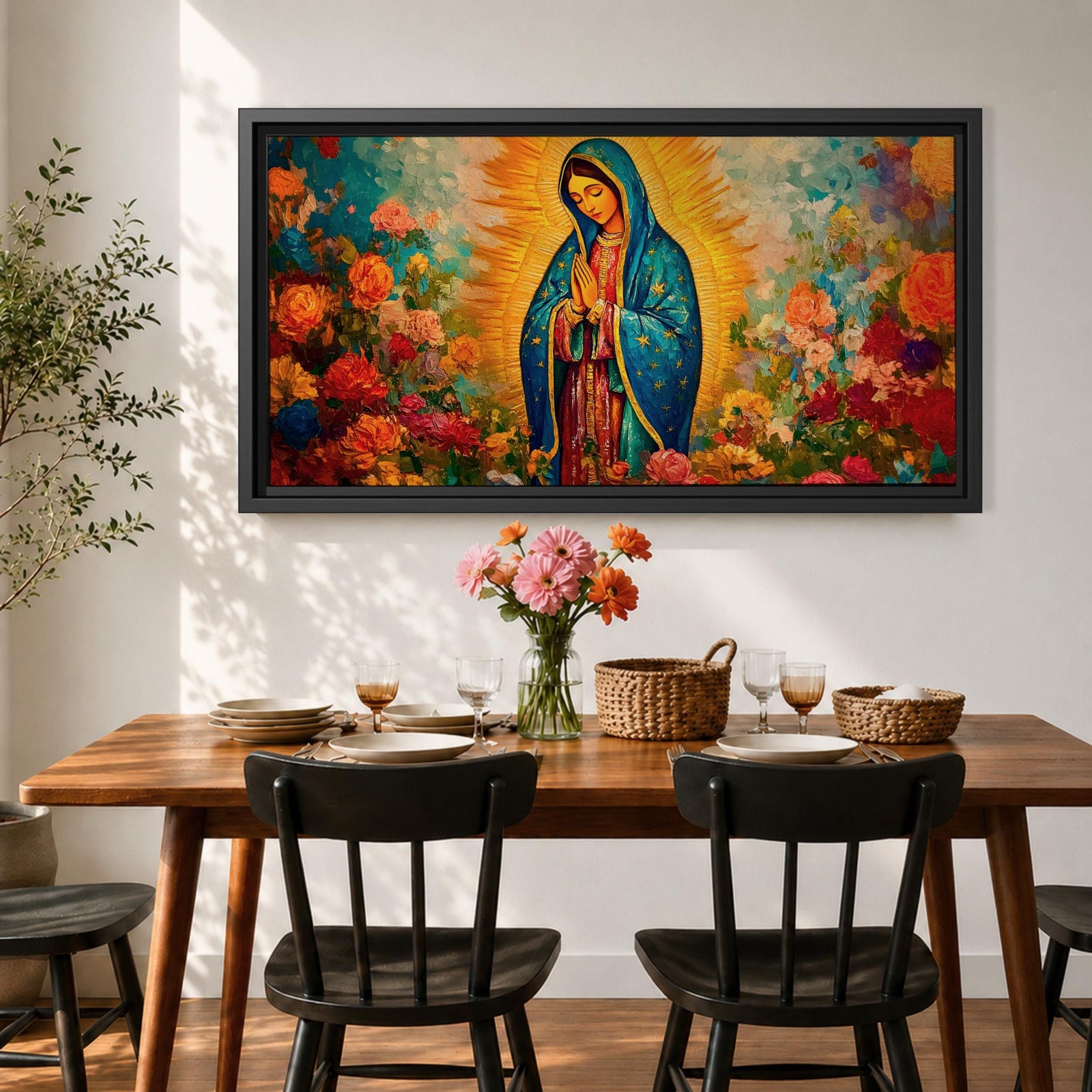 A panoramic painting of the Virgin Mary depicted as Our Lady of Guadalupe standing in prayer with hands together, wearing a blue star covered mantle and red dress, surrounded by radiant golden light and vibrant blooming flowers in rich reds, pinks, and oranges painted with expressive textured brushstrokes.