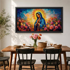 Panoramic painting of the Virgin Mary with hands clasped in prayer wearing a deep blue mantle decorated with golden stars and surrounded by vibrant blooming roses. A radiant golden halo glows behind her head while expressive brushstrokes form colorful clouds and flowers creating a wide devotional religious composition.