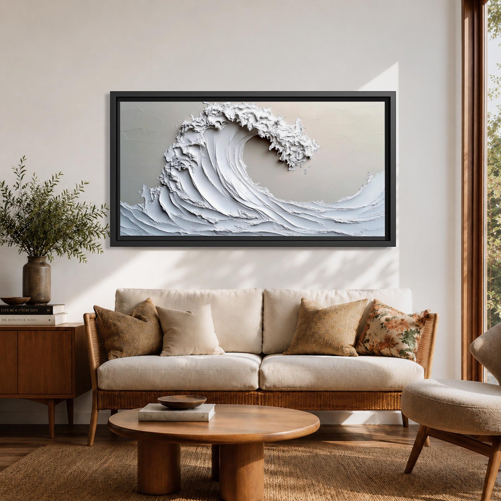 Panoramic textured relief artwork depicting a powerful ocean wave curling upward in sculpted layered forms. The cresting breaker is rendered with thick plaster like ridges and flowing contours in soft neutral tones, creating a minimalist seascape with depth and movement across the wide horizontal composition.