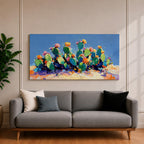 Panoramic painting of desert prickly pear cactus plants with bright pink and yellow blooming flowers growing across a colorful arid landscape. Thick palette knife brushstrokes create textured cactus pads vibrant blossoms and layered desert hills beneath a glowing sky forming a wide southwestern desert scene.