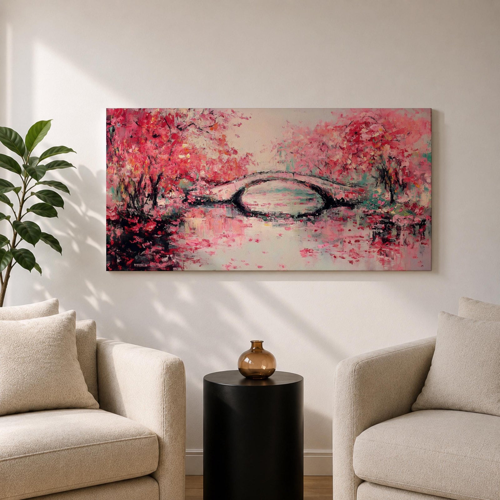 Panoramic painting of blooming cherry blossom trees with soft pink petals surrounding a curved bridge over calm water during spring. Layers of textured brushstrokes form clusters of blossoms drifting across the scene while reflections shimmer on the surface creating a wide Japanese inspired spring landscape composition.