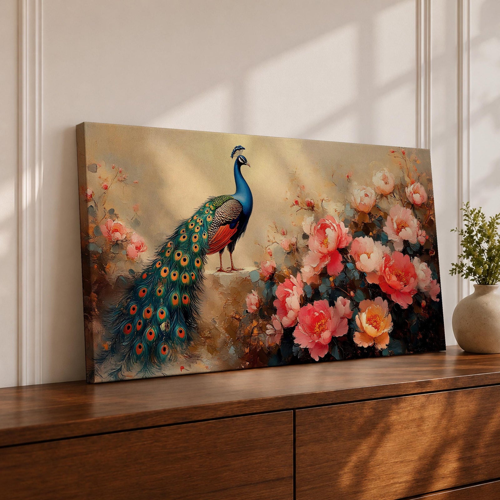 Panoramic painting of a vibrant peacock standing among blooming pink and coral peony flowers with its long iridescent tail cascading across the composition. Thick palette knife brushstrokes form layered petals textured foliage and detailed feather eyes creating a wide horizontal floral bird scene with rich color contrast.