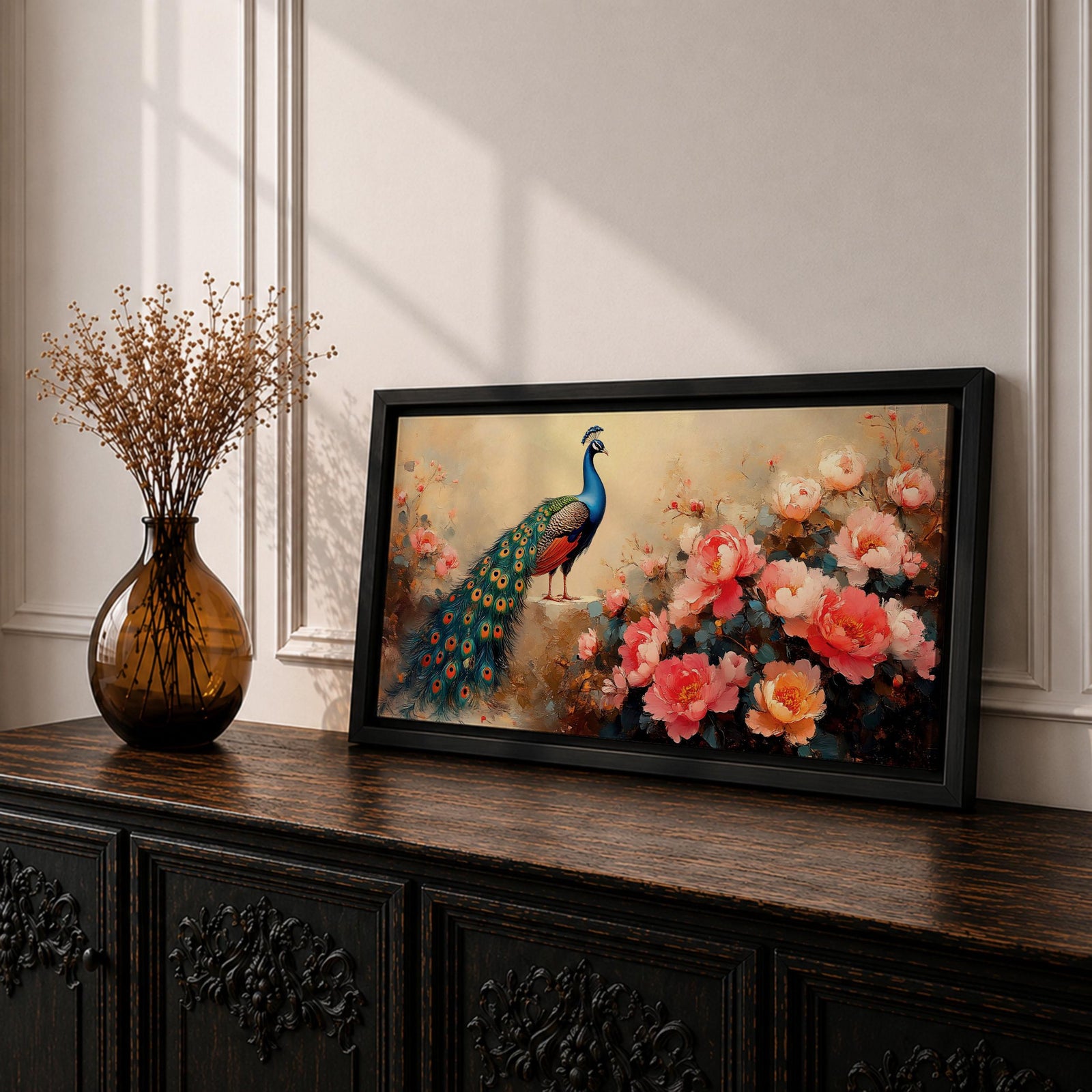 Panoramic painting of a vibrant peacock standing among blooming pink and coral peony flowers with its long iridescent tail cascading across the composition. Thick palette knife brushstrokes form layered petals textured foliage and detailed feather eyes creating a wide horizontal floral bird scene with rich color contrast.