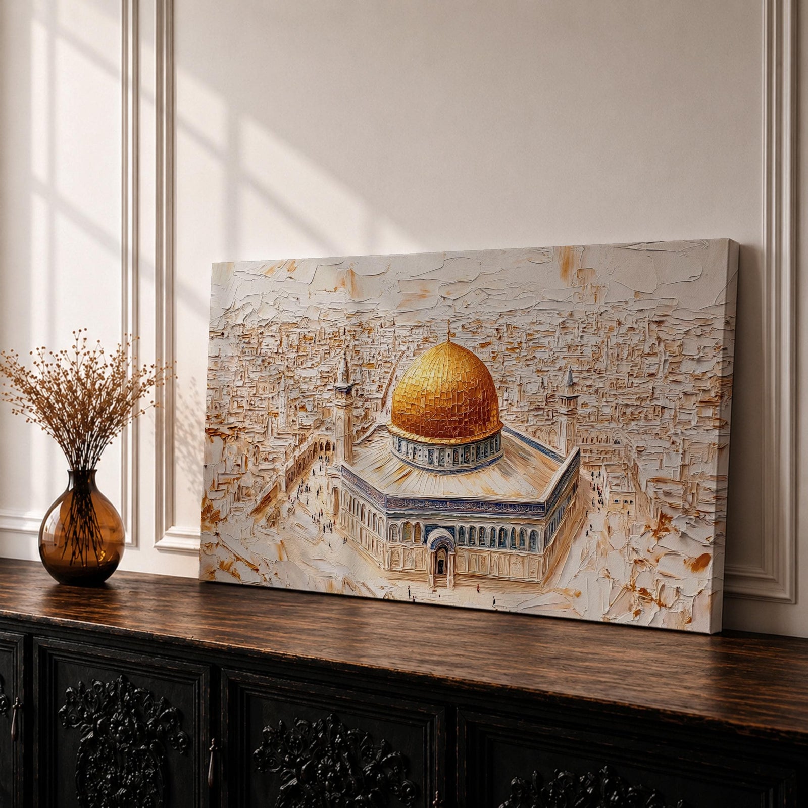 Panoramic textured painting of the Dome of the Rock in Jerusalem featuring the large golden dome rising above the octagonal shrine with blue and stone architectural details. The surrounding Jerusalem cityscape spreads across the background in layered neutral tones while small figures and pathways create depth in the wide horizontal composition.
