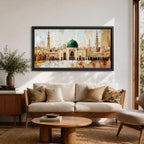 Panoramic painting of Al Masjid an Nabawi in Medina featuring the iconic green dome centered among ornate mosque architecture and tall minarets rising against a warm textured skyline. Thick palette knife strokes form arches domes and city structures creating a wide horizontal Islamic architectural scene with layered gold beige and green tones.