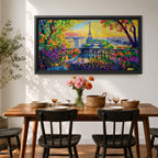 Panoramic painting of the Tour Eiffel rising above the Paris skyline viewed from the Champ de Mars with colorful textured brushstrokes forming surrounding buildings trees and glowing sky. Thick palette knife layers create vibrant reflections architectural details and expressive tones across the wide cityscape composition.