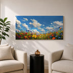 A panoramic painting of a colorful wildflower meadow under a bright blue sky with soft clouds, creating a vibrant and uplifting landscape scene.