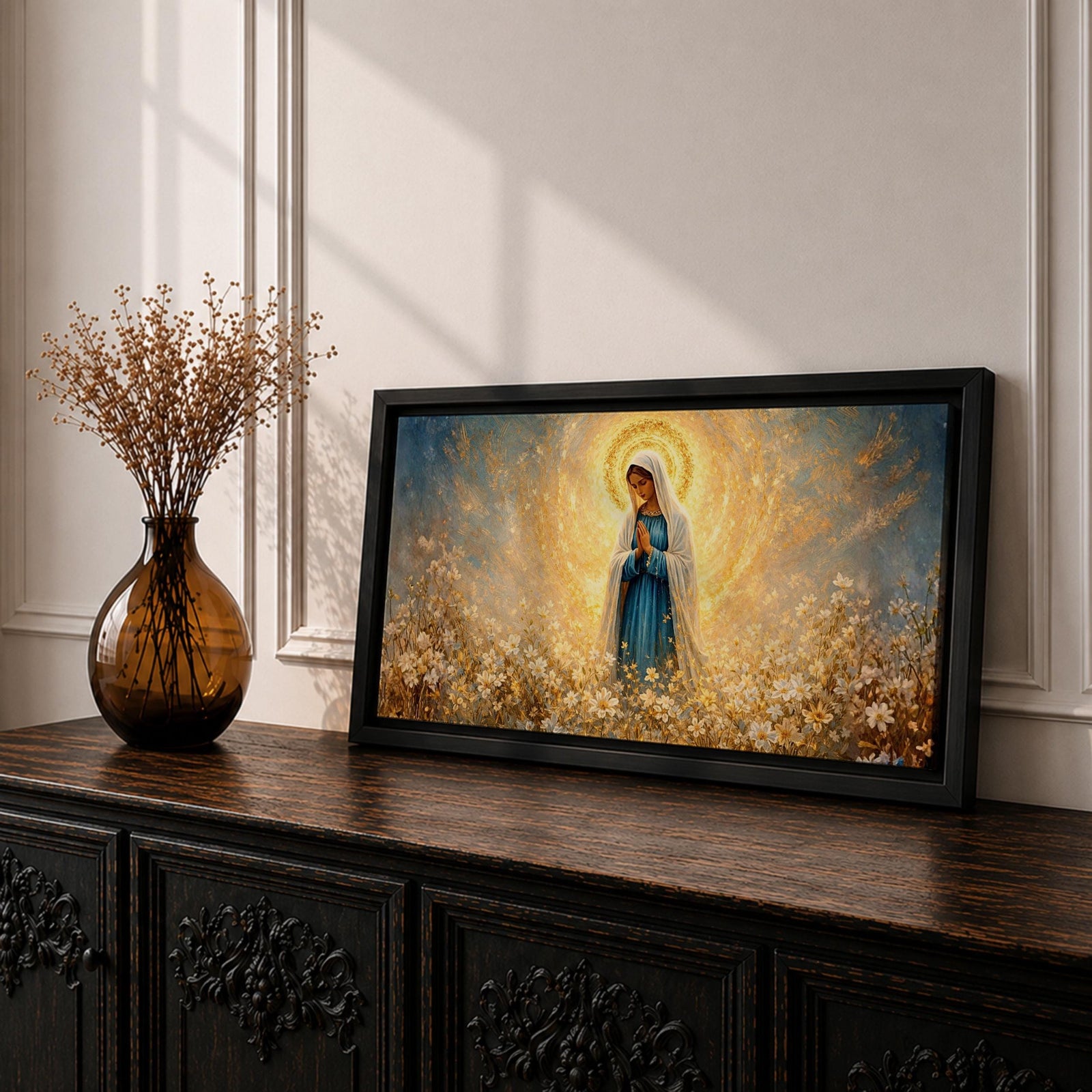 A glowing portrait of Virgin Mary stands in prayer within a wildflower meadow, surrounded by white blossoms and a radiant golden halo, painted in a textured style with luminous blue and gold tones, soft brushwork, and a serene devotional composition blending floral scenery with sacred light.