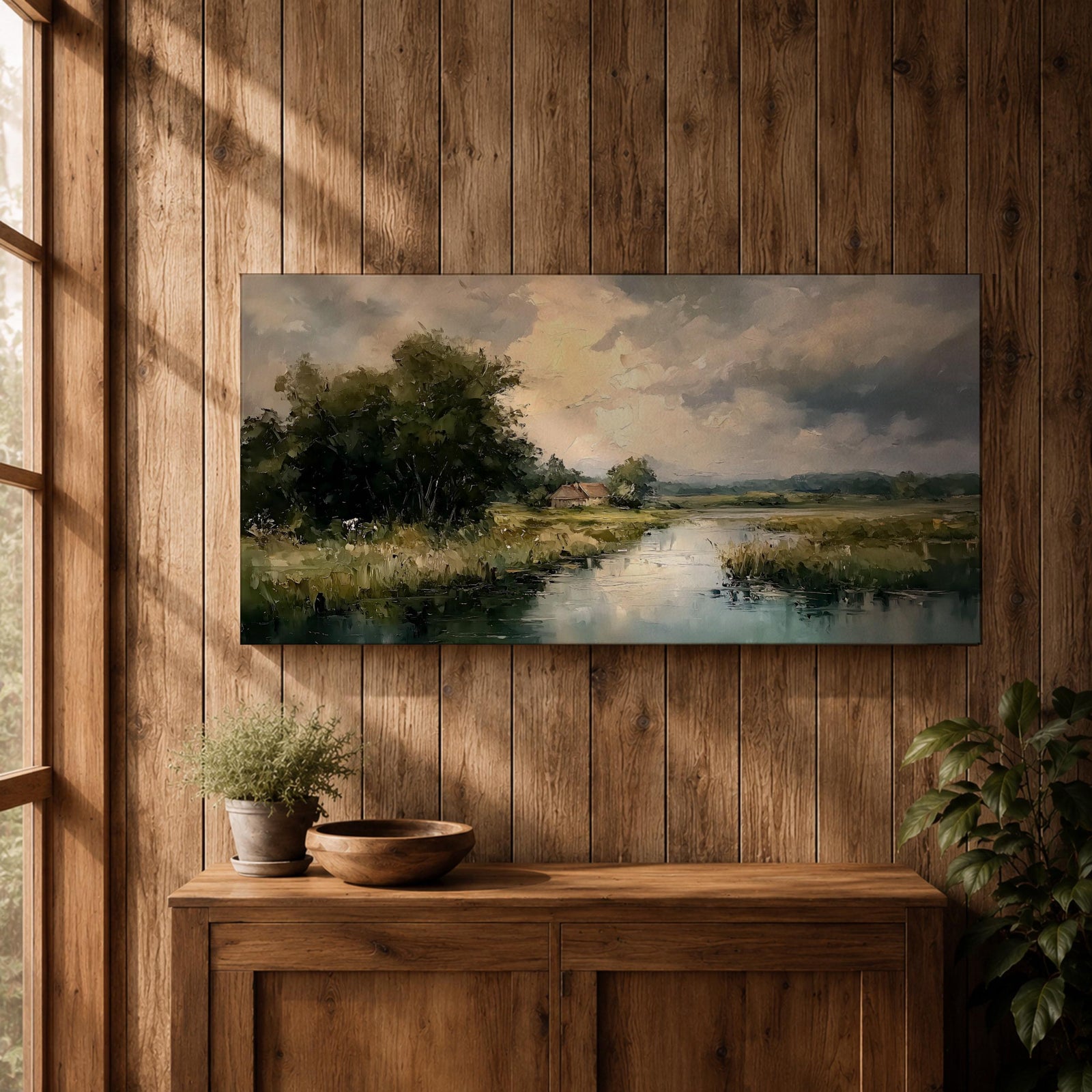 A panoramic painting of a quiet countryside river winding through grassy fields, with trees clustered along the bank and a distant cottage beneath a cloudy sky, rendered in a soft impressionistic style with textured brushstrokes and muted natural tones across a wide landscape composition.