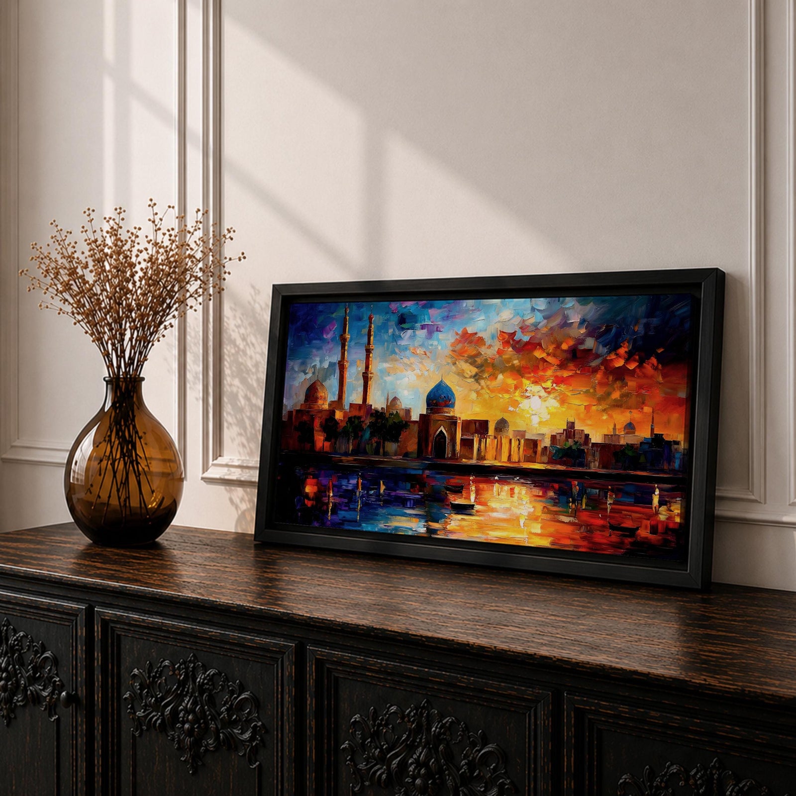A vibrant panoramic painting of an Islamic city skyline with domes and minarets at sunset, reflecting in water below, rendered in bold expressive brushstrokes with rich orange, blue, and gold tones.