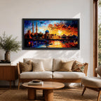 A vibrant panoramic painting of an Islamic city skyline with domes and minarets at sunset, reflecting in water below, rendered in bold expressive brushstrokes with rich orange, blue, and gold tones.