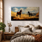 A panoramic painting of two wild horses standing in a sunlit open field, one chestnut and one black, surrounded by golden grasses and rolling hills beneath a dramatic sky filled with soft clouds, rendered in expressive brushstrokes that capture movement, light, and a natural untamed landscape.