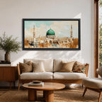 Panoramic abstract painting of Masjid Nabawi in Medina featuring the iconic green dome and two slender minarets rising above arches and mosque courtyards. The artwork uses thick textured brushstrokes in warm sand, gold, and cream tones with turquoise sky accents, highlighting the vibrant green dome in a wide horizontal composition.