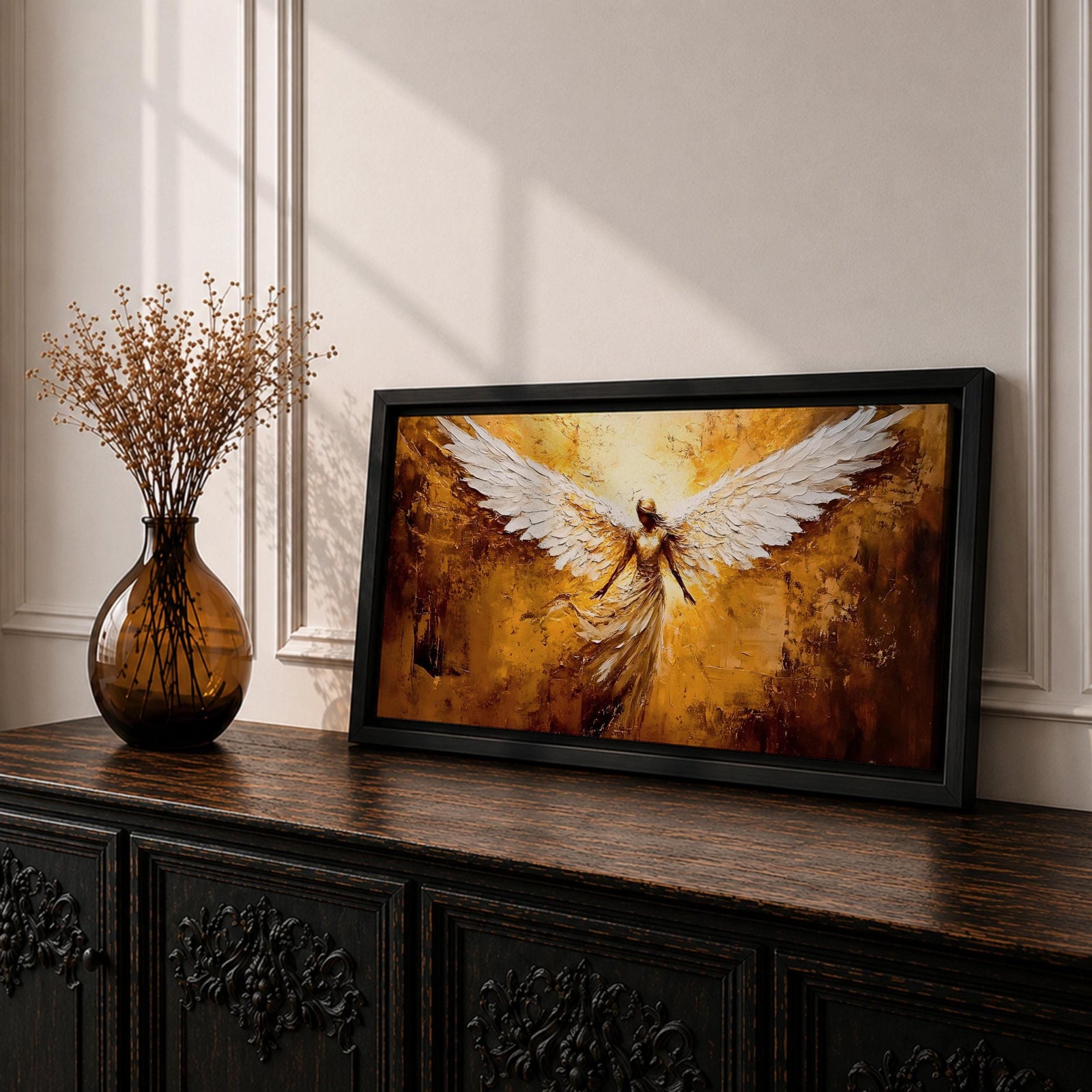 Panoramic painting of a luminous winged figure rising in radiant golden light with large white feathered wings spread wide. The composition uses thick textured brushstrokes in gold, amber, and bronze tones with flowing robes and glowing highlights that emphasize the dramatic celestial presence.