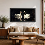 Panoramic painting of two white swans facing each other on dark reflective water with graceful curved necks forming a symmetrical composition. The birds glow against a deep black background with shimmering reflections and textured brushstrokes highlighting feathers and light across the calm water surface.