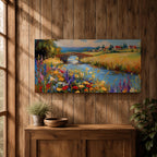 Panoramic landscape painting of a winding river flowing through a countryside meadow filled with colorful wildflowers. A small stone bridge arches over the water while fields, cottages, and rolling hills stretch into the distance under a bright sky, rendered with vibrant textured brushstrokes.