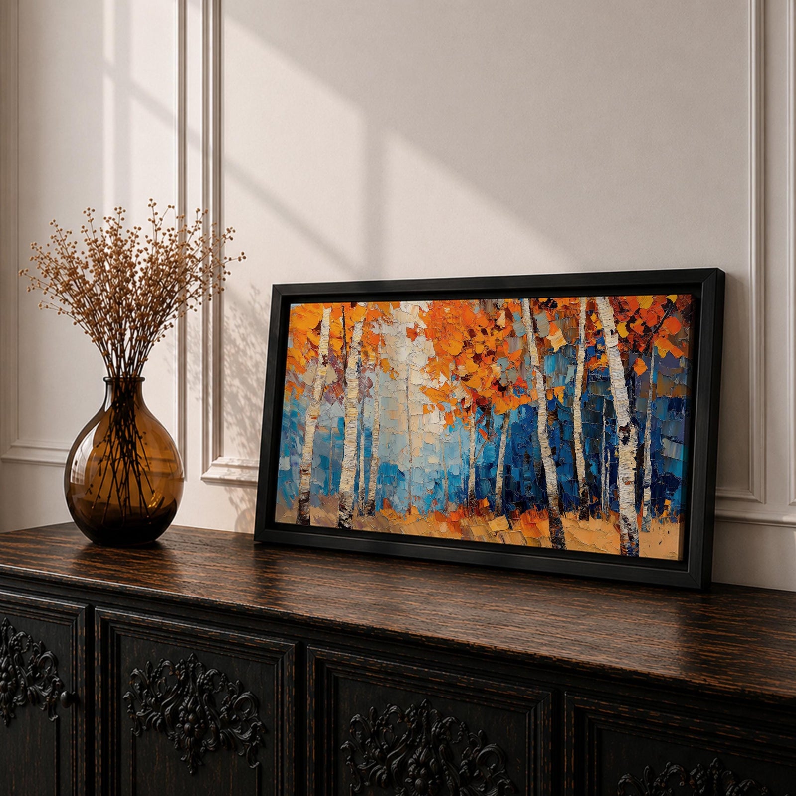 Panoramic painting of tall white birch trees with textured bark standing among vivid orange autumn foliage. Thick palette knife brushstrokes create layered leaves and forest floor tones, with warm golden light filtering through the canopy against cool blue woodland shadows.