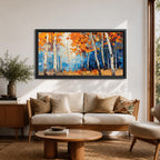 Panoramic painting of tall white birch trees with textured bark standing among vivid orange autumn foliage. Thick palette knife brushstrokes create layered leaves and forest floor tones, with warm golden light filtering through the canopy against cool blue woodland shadows.