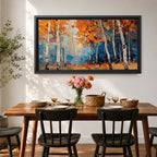 Panoramic painting of tall white birch trees with textured bark standing among vivid orange autumn foliage. Thick palette knife brushstrokes create layered leaves and forest floor tones, with warm golden light filtering through the canopy against cool blue woodland shadows.