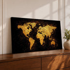 Panoramic artwork of a world map rendered in textured metallic gold against a deep black background. The continents appear with rough painterly edges and splattered gold accents, creating a bold global composition with strong contrast and modern map styling.