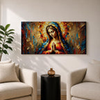 Panoramic textured painting of the Virgin Mary with hands clasped in prayer and a radiant halo behind her head. The composition features expressive palette knife strokes in gold, blue, red, and warm earth tones forming a luminous devotional portrait.