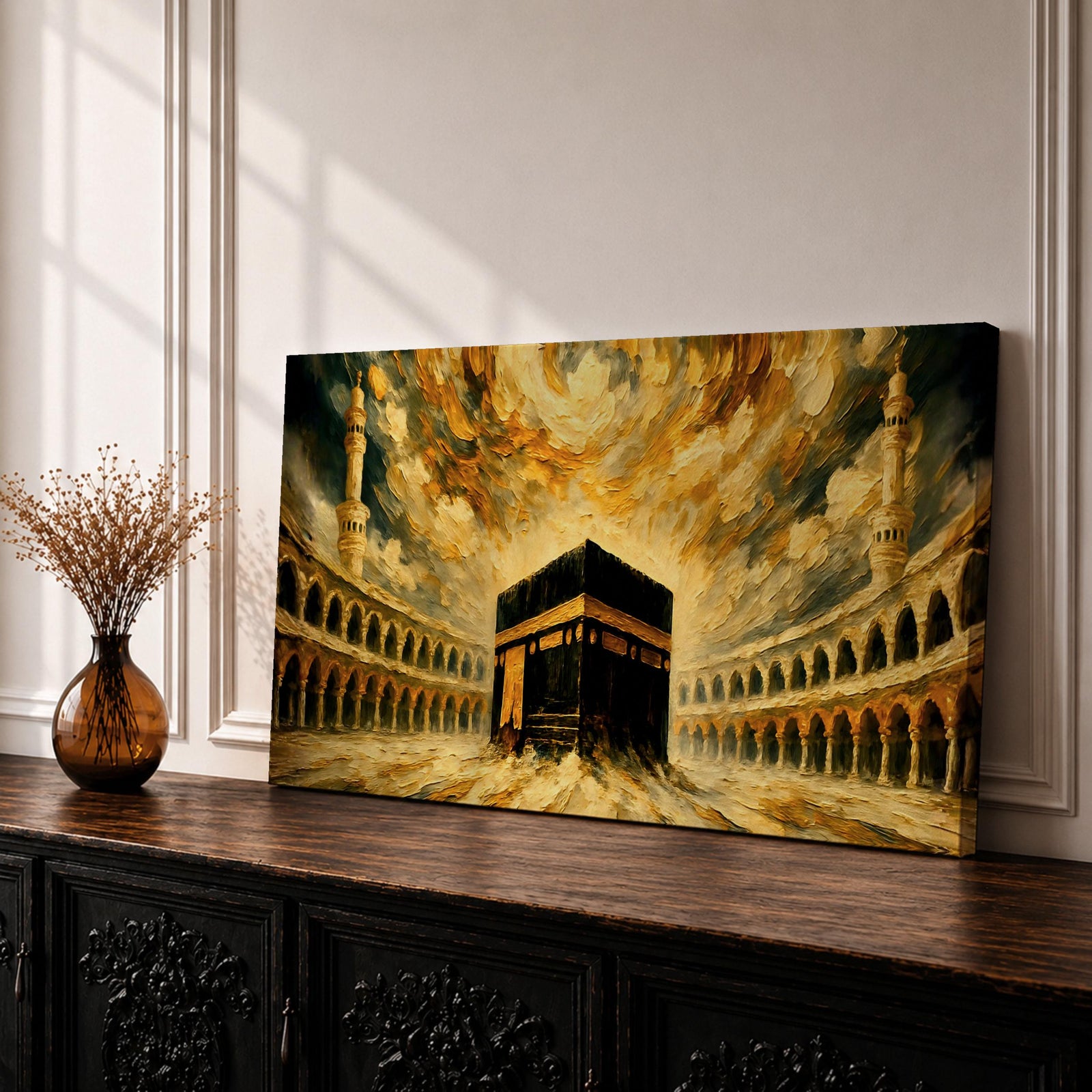 Panoramic painting of the Kaaba at the center of Masjid al Haram courtyard surrounded by mosque arches and tall minarets. Dramatic golden clouds swirl above the sacred structure while expressive brushstrokes in warm gold and dark tones create a powerful architectural composition.