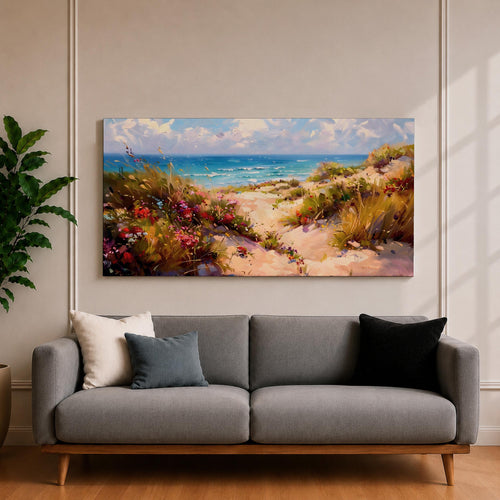 Panoramic coastal landscape painting of sandy beach dunes leading toward turquoise ocean waves under a bright sky. Tall grasses and colorful wildflowers line a winding path through the dunes, painted with loose textured brushstrokes capturing sunlight, sea breeze, and shoreline scenery.