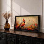 Panoramic painting of a bright red cardinal perched on a thin branch surrounded by warm autumn foliage with textured painterly brushstrokes and glowing seasonal tones.