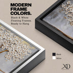 Panoramic artwork of a white blossoming tree with a flowing golden trunk and roots spreading across a textured gray background symbolizing the tree of life.