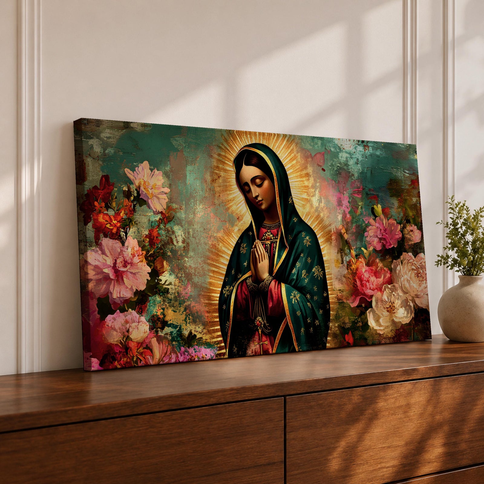Panoramic painting of the Virgin Mary with hands in prayer surrounded by colorful flowers and a radiant golden halo in a devotional Catholic composition.