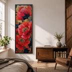 A tall, narrow vertical painting of bold red poppy flowers with layered petals and detailed centers, set against a deep navy and gold textured abstract background, featuring rich contrast, fluid brushwork, and metallic accents that highlight the organic forms in a contemporary floral composition.