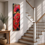 A tall, narrow vertical painting of bold red poppy flowers with layered petals and detailed centers, set against a deep navy and gold textured abstract background, featuring rich contrast, fluid brushwork, and metallic accents that highlight the organic forms in a contemporary floral composition.