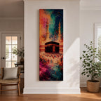 A tall narrow vertical depiction of the Kaaba in Mecca surrounded by a gathering of pilgrims, rendered in an abstract expressive style with bold layered brushwork, deep blues, warm oranges, and rich magenta tones blending into a textured composition that conveys movement, depth, and energy.