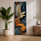 A tall vertical artwork depicts a majestic phoenix with outstretched wings rendered in intricate feather detail, its white and gold plumage glowing against swirling dark blue and smoky cloud forms, while flowing golden flames trail from its body, blending Asian-inspired brushwork with dynamic movement and a mythic, firebird presence.