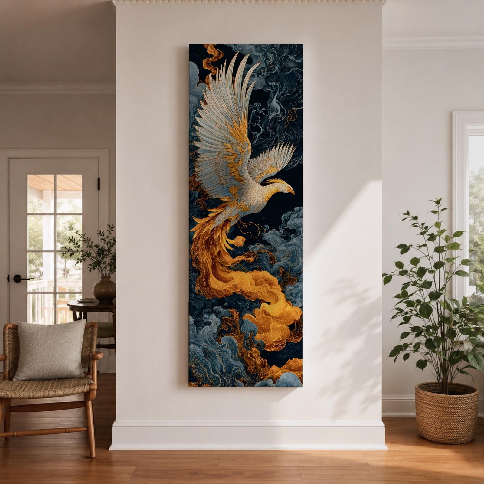 A tall vertical artwork depicts a majestic phoenix with outstretched wings rendered in intricate feather detail, its white and gold plumage glowing against swirling dark blue and smoky cloud forms, while flowing golden flames trail from its body, blending Asian-inspired brushwork with dynamic movement and a mythic, firebird presence.