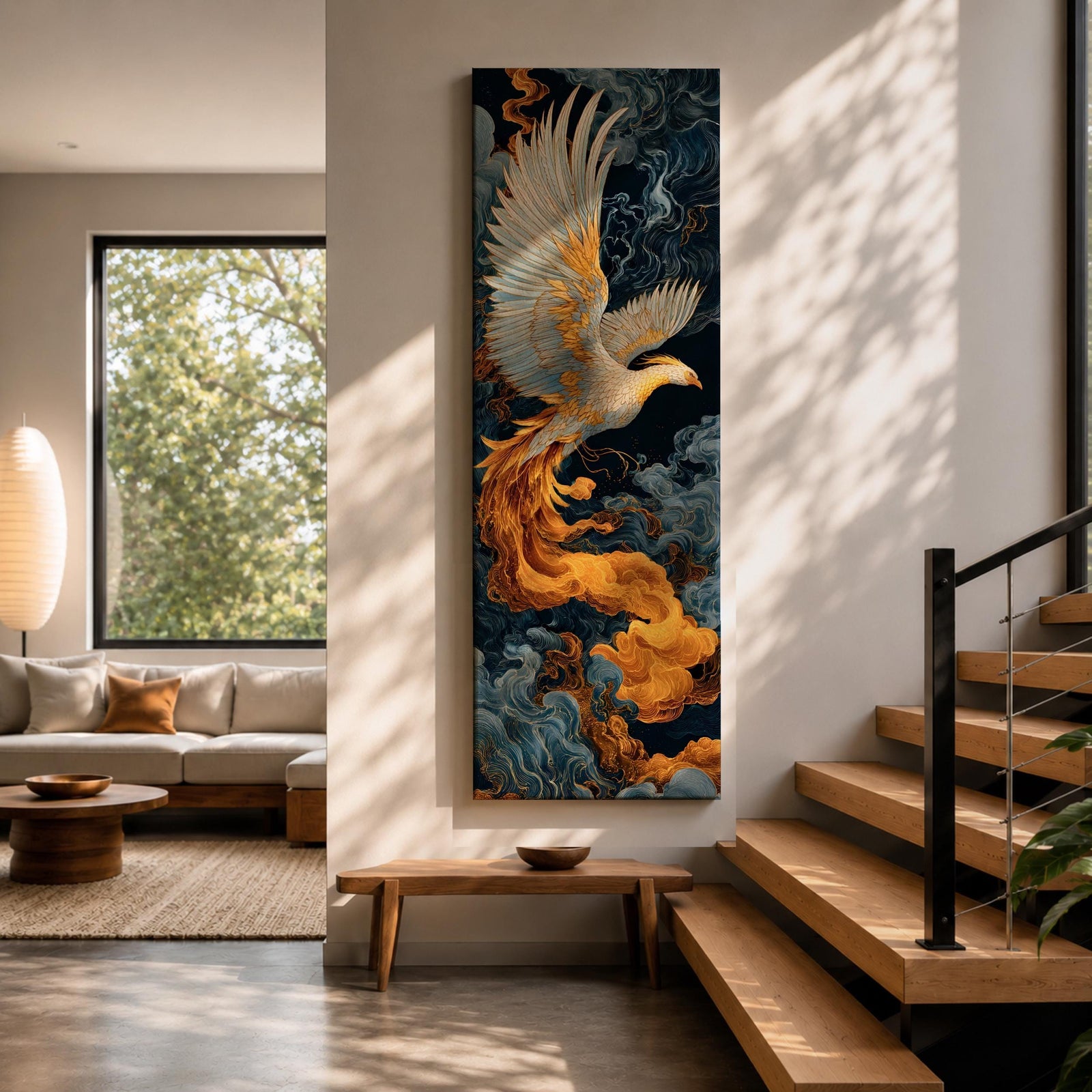 A tall vertical artwork depicts a majestic phoenix with outstretched wings rendered in intricate feather detail, its white and gold plumage glowing against swirling dark blue and smoky cloud forms, while flowing golden flames trail from its body, blending Asian-inspired brushwork with dynamic movement and a mythic, firebird presence.