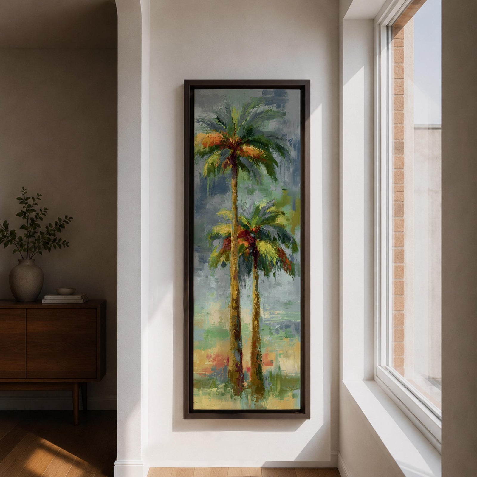 A tall narrow painting of two palm trees with slender trunks and lush green fronds, rendered in expressive brushstrokes with layered tones of green, gold, and soft red against a muted abstract background of blue and gray, creating a loose impressionistic tropical landscape composition.