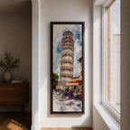 Long vertical watercolor style painting of the Leaning Tower rising above a lively Italian piazza with outdoor café tables and people walking along a stone street. The famous marble tower tilts gently against a bright sky while expressive brushstrokes capture the atmosphere of a historic Italian landmark and travel scene.
