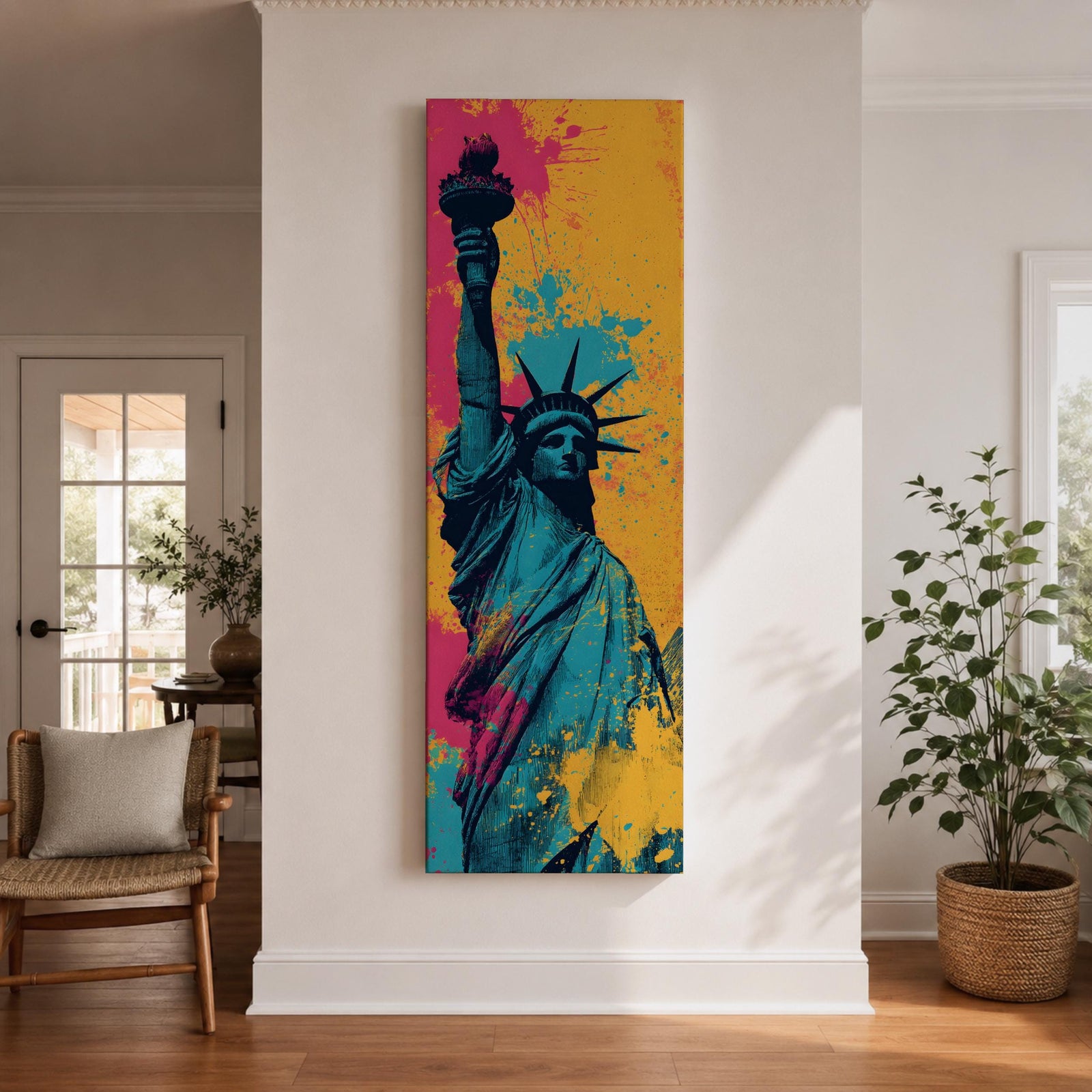 A tall narrow artwork of the Statue of Liberty shown from a low angle with the torch raised, rendered in bold pop art style with vibrant teal tones contrasted by bright pink and yellow paint splashes, featuring dynamic splatter textures and graphic shading in a modern abstract urban composition.