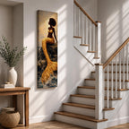 A tall narrow vertical depiction of a Black mermaid with a natural afro hairstyle seated on rocky shoreline, her shimmering gold tail cascading downward into the water, rendered with textured tile like detail and warm light reflecting across her form, creating a bold composition with contrast, depth, and coastal atmosphere.