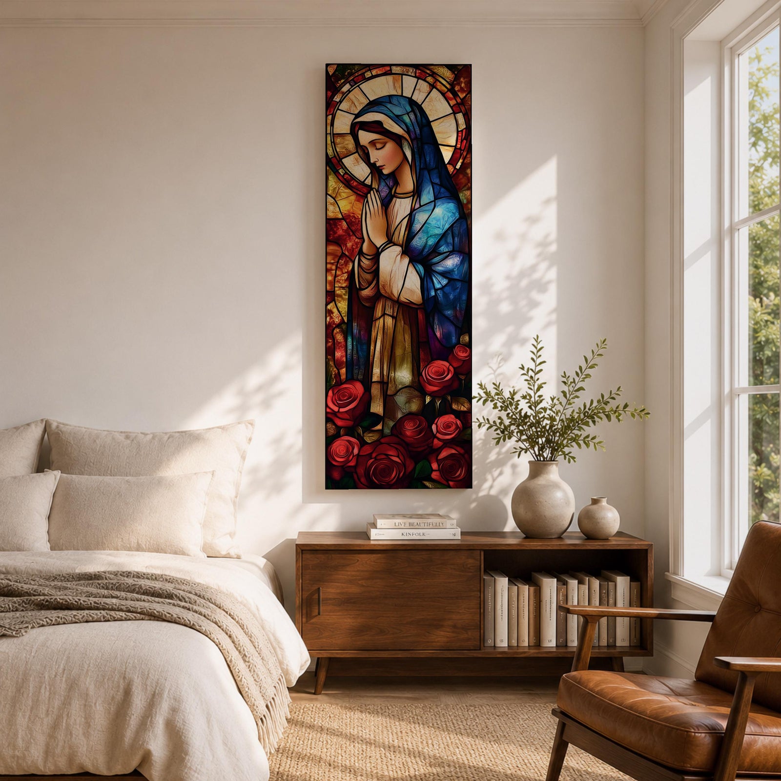 Long vertical stained glass style depiction of the Virgin Mary with hands clasped in prayer. She wears a blue mantle and cream robe while a circular halo glows behind her head and red roses bloom at her feet, all formed with colorful glass segments in a luminous devotional composition.